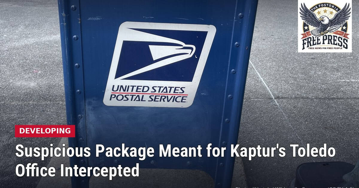 A blue U.S. Postal Service collection box, with headline: Suspicious Package Meant for Kaptur's Toledo Office Intercepted